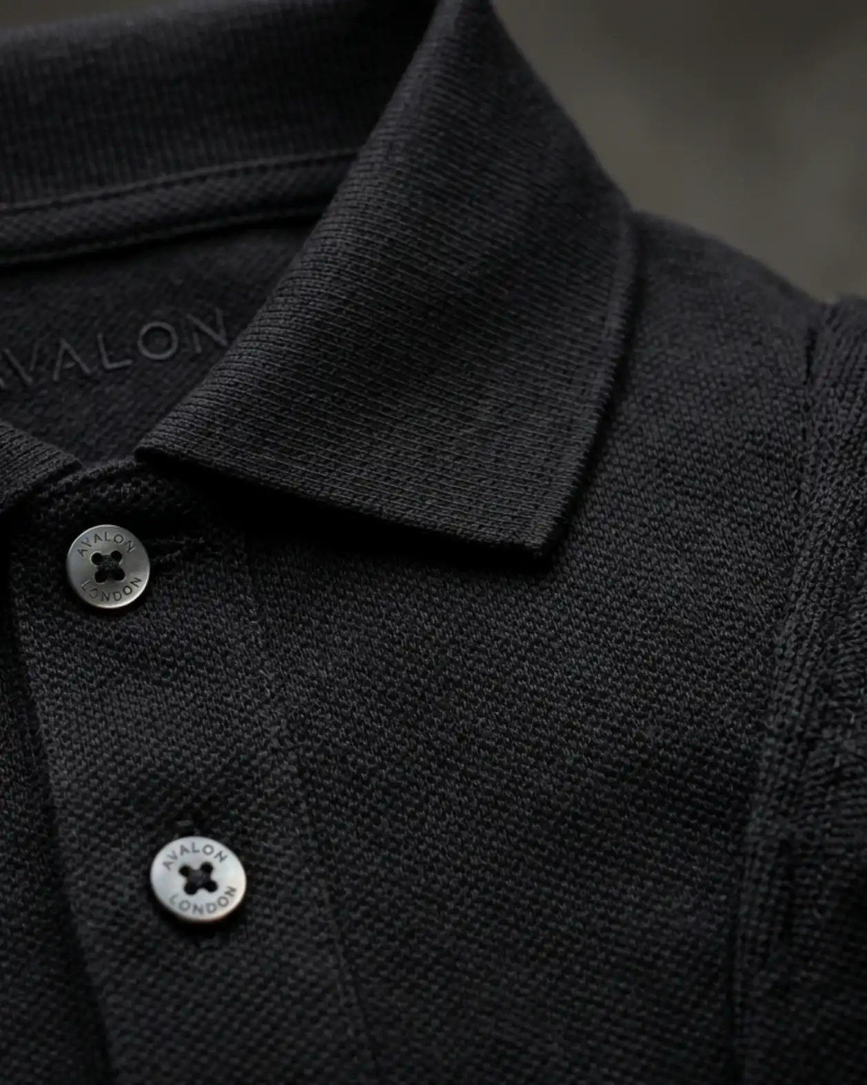Premium Black Cotton Polo T-Shirt Fabric with Pique Texture for Custom Printing and Corporate Uniforms