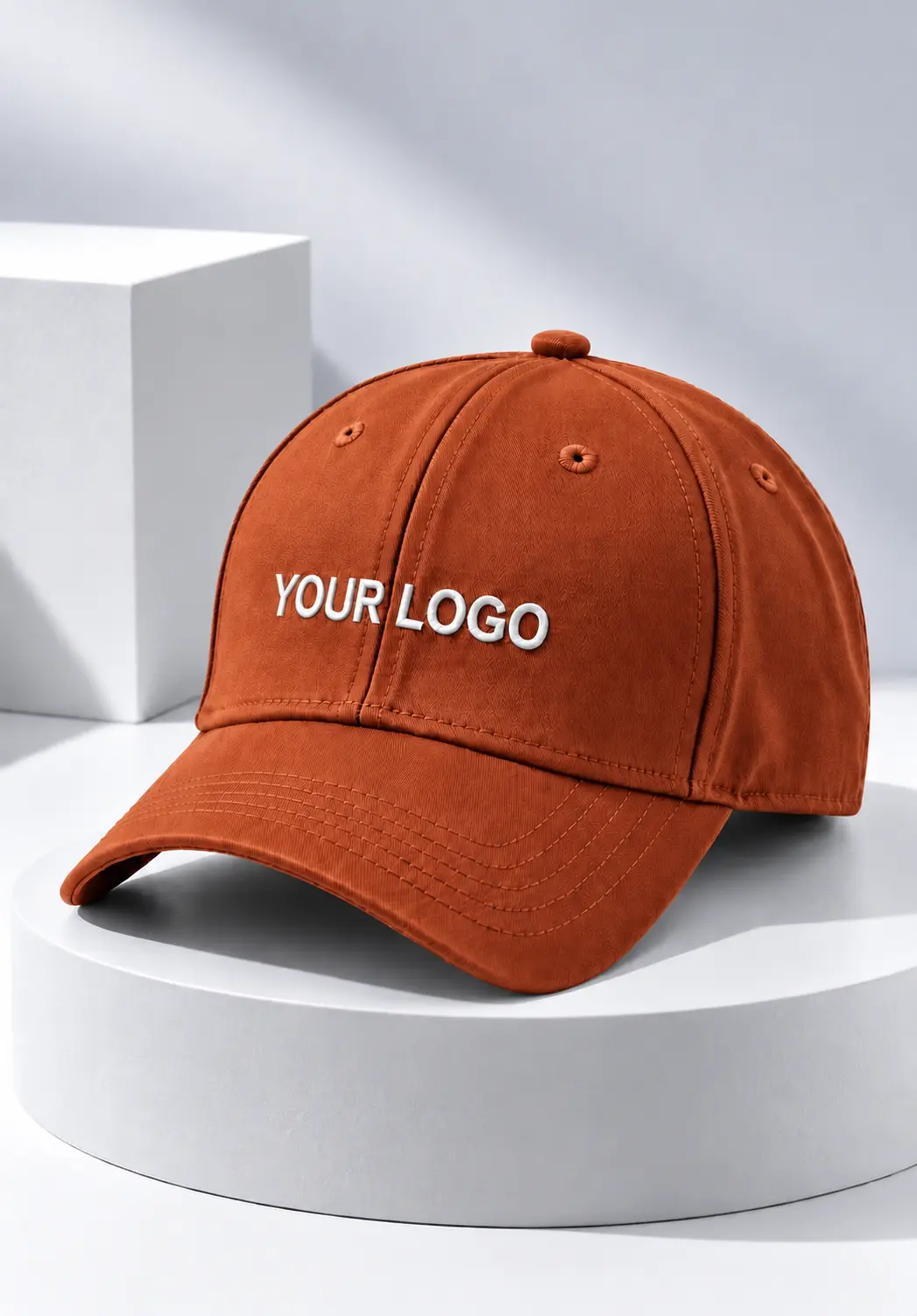 Custom name cap in rust orange with white custom logo on the front