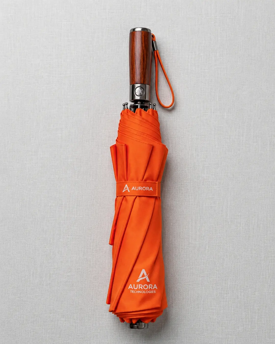 Orange personalized folding umbrella with custom logo printing for promotional gifting
