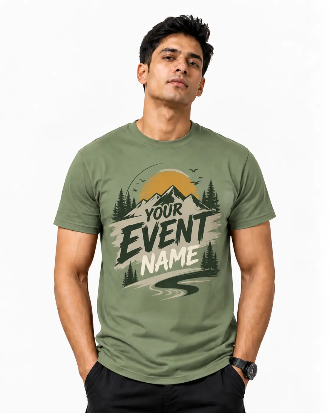 Sage green custom event T-shirt featuring a mountain and sun graphic with event lettering, suitable for event crew apparel and outdoor gatherings.